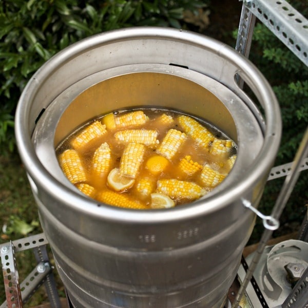 pot of corn boiling for a shrimp boil