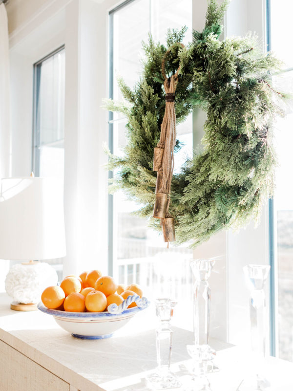 wreath with bowl of oranges | Ways To Stay Healthy This Holiday Season