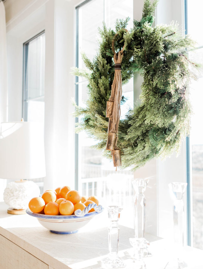 wreath with bowl of oranges | Ways To Stay Healthy This Holiday Season