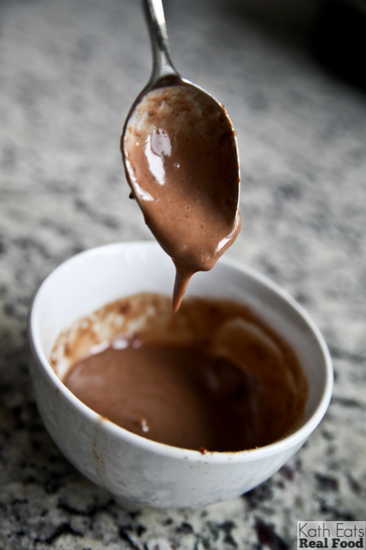 drippy chocolate peanut butter sauce on a spoon