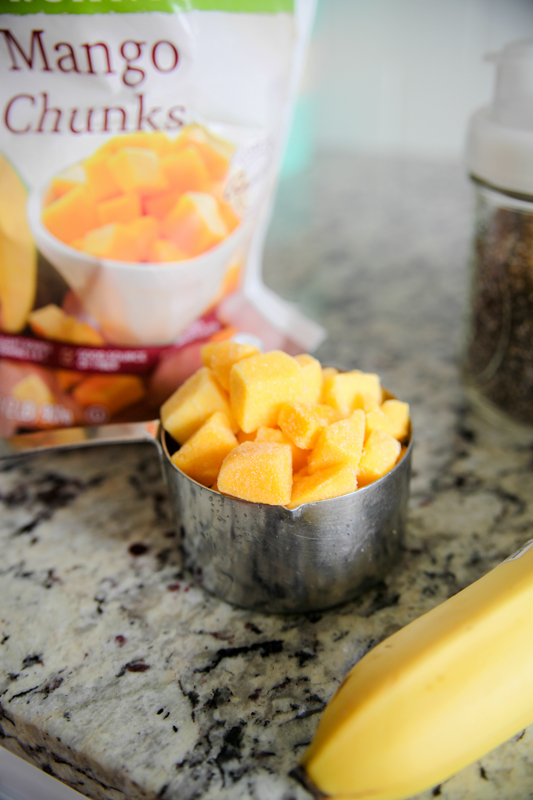 frozen mango in measuring cup