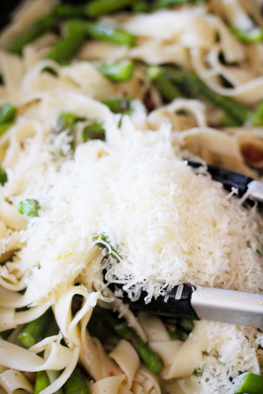 lots of parmesan on top of pasta