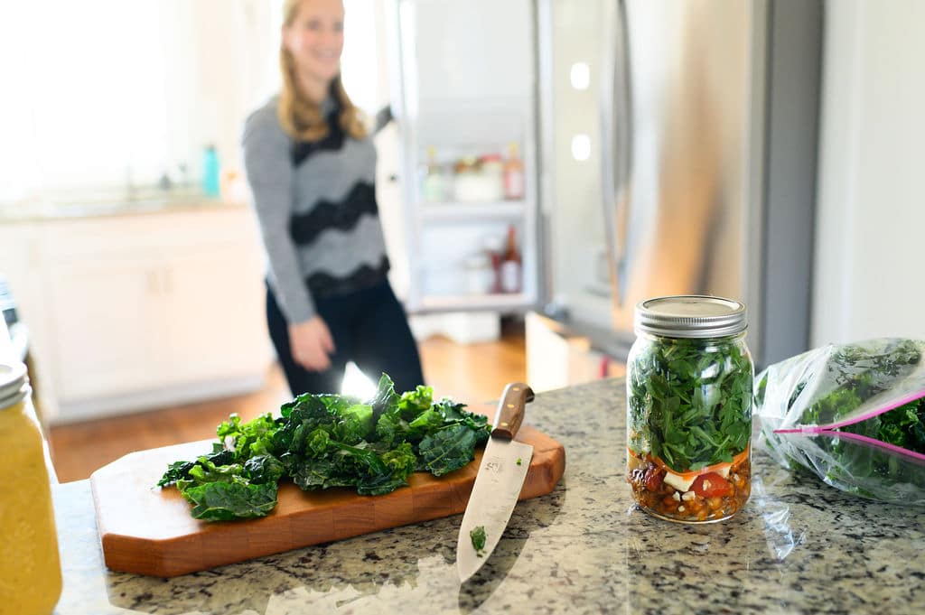 kath younger's kitchen with kale on a cutting board