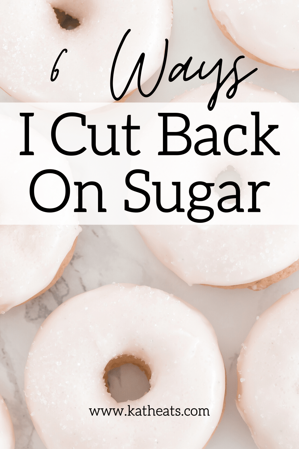 6 Ways I Cut Back On Sugar: overhead shot of light pink donuts with text overlay.