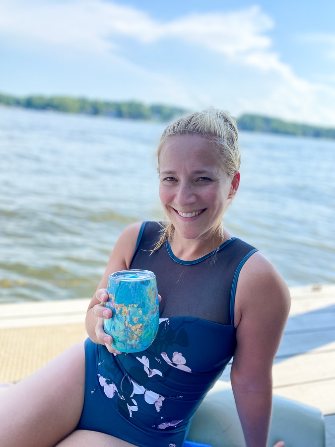 drinking wine on a dock