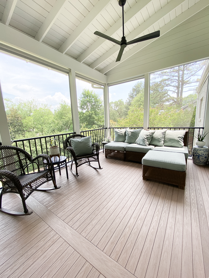 tongue and groove wolf composite flooring in weathered ipe on screened in porch