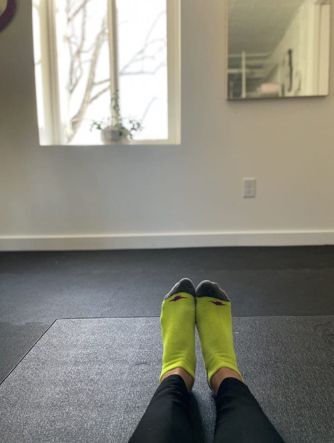 socks on a yoga mat in a fitness room