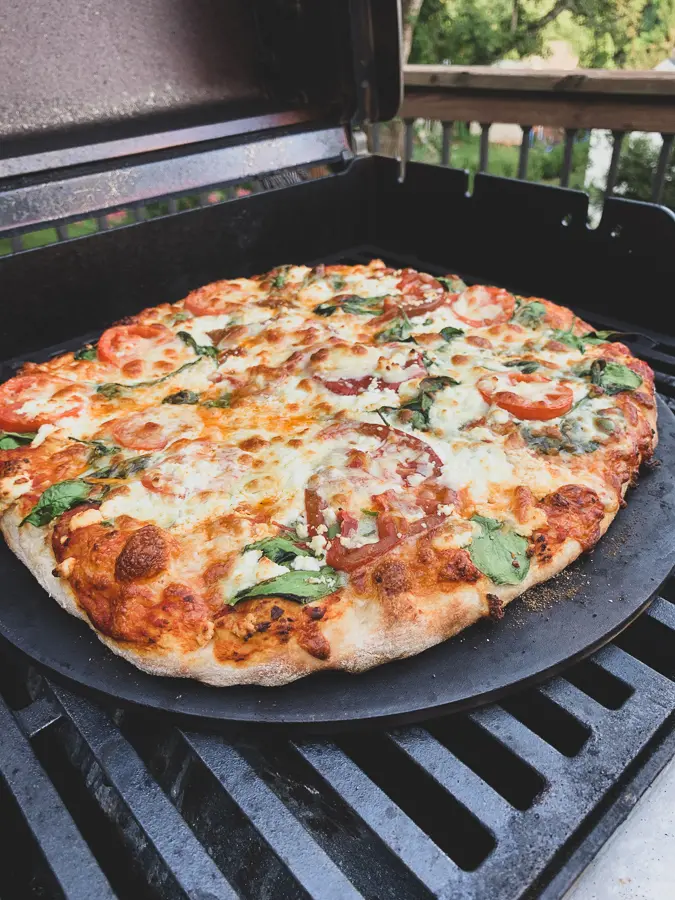pizza dough on a pizza stone