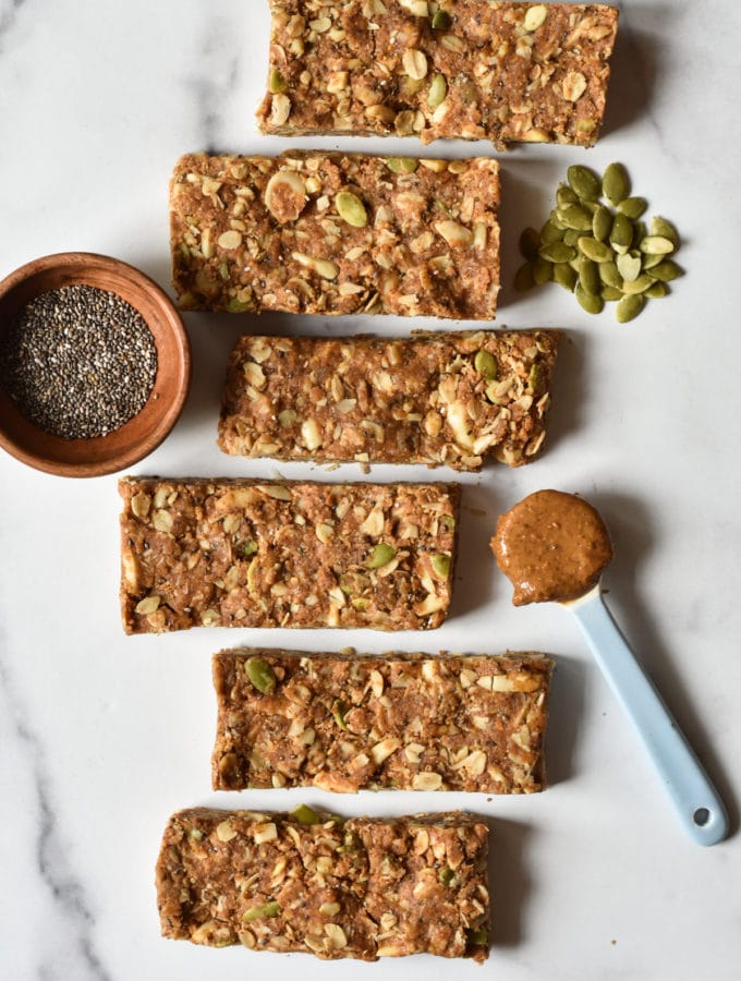 Easy Energy Bar Recipe with dish of chia seeds and spoon of almond butter