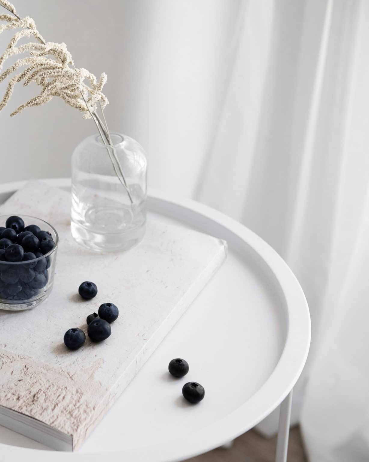 blueberries on a white tray