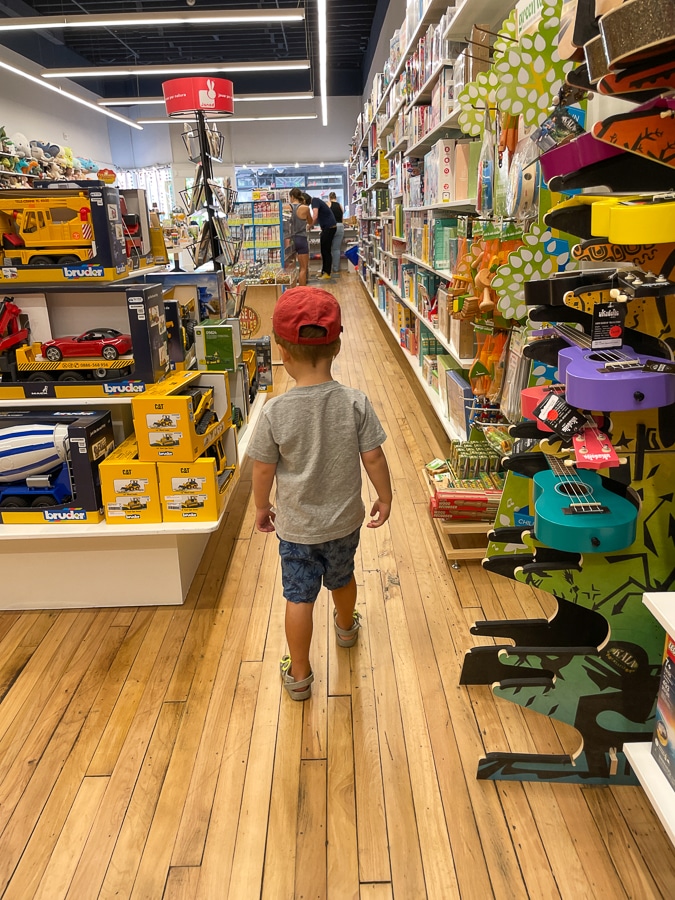 child at a toy store