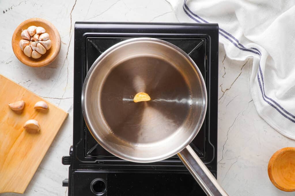 toast garlic on pan