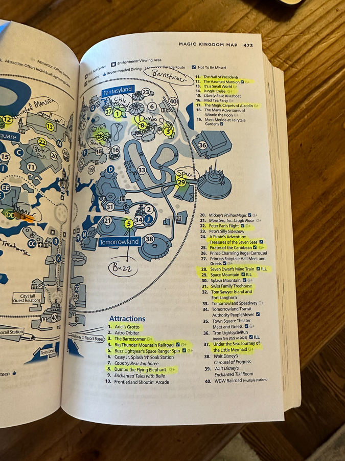 Disney Guide book marked pages