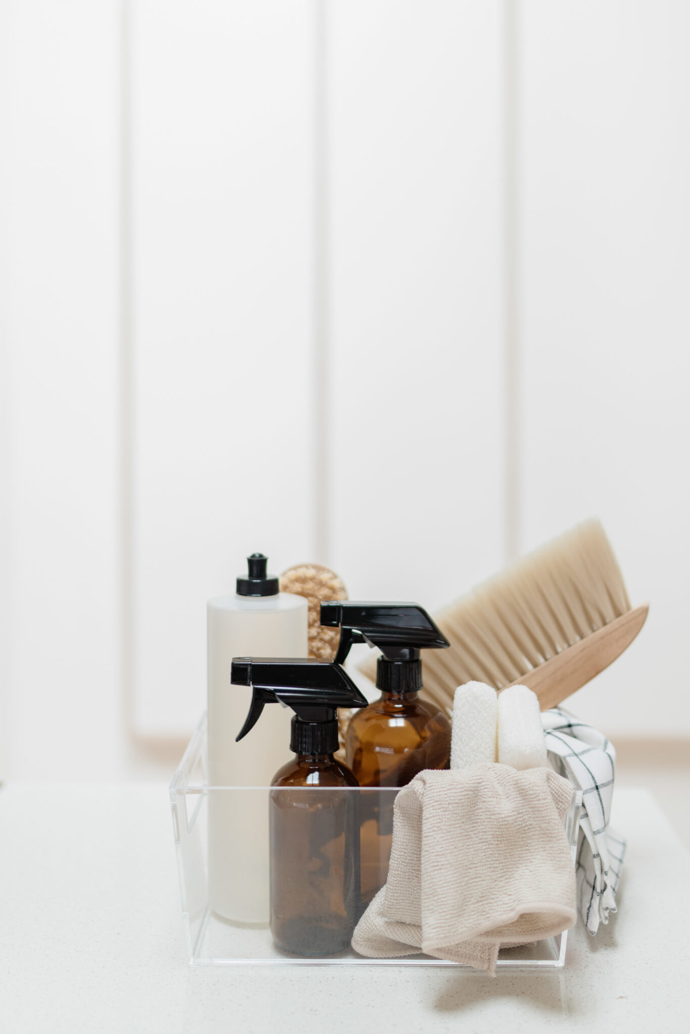cleaning supplies in clear bin | How To Keep Your Home Smelling Fresh And Clean