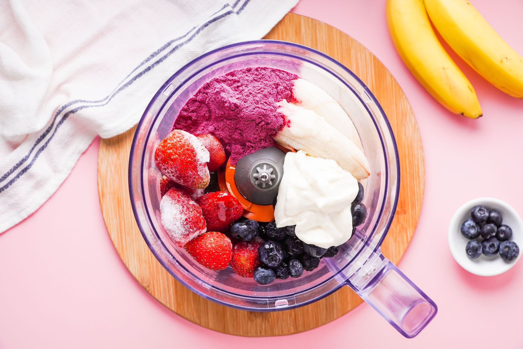 How To Make An Acai Bowl // overhead shot of acai bowl ingredients in blender