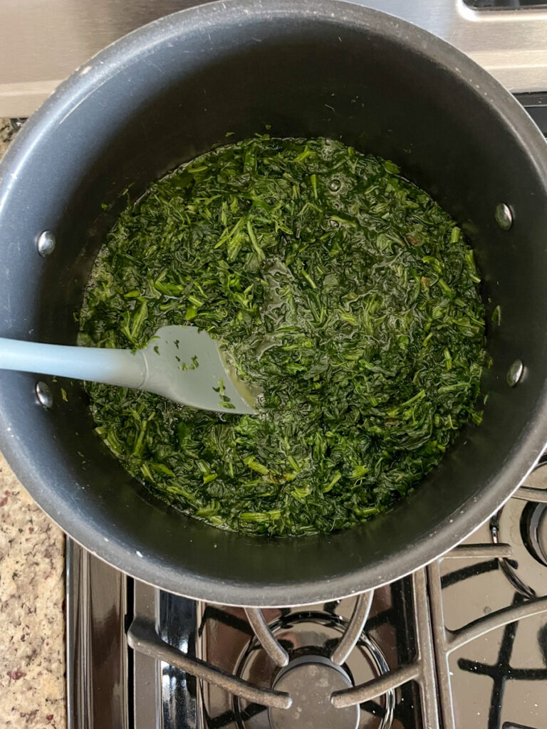 Cook spinach and then drain as well