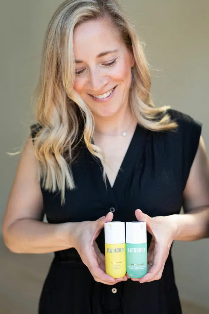 Kath Eats Blogger Kath Younger shares Beautycounter Sale - in photo: Kath holding two bottles form Beautycounter Kath Eats Blogger Kath Younger shares Beautycounter Sale - in photo: Kath holding two bottles form Beautycounter