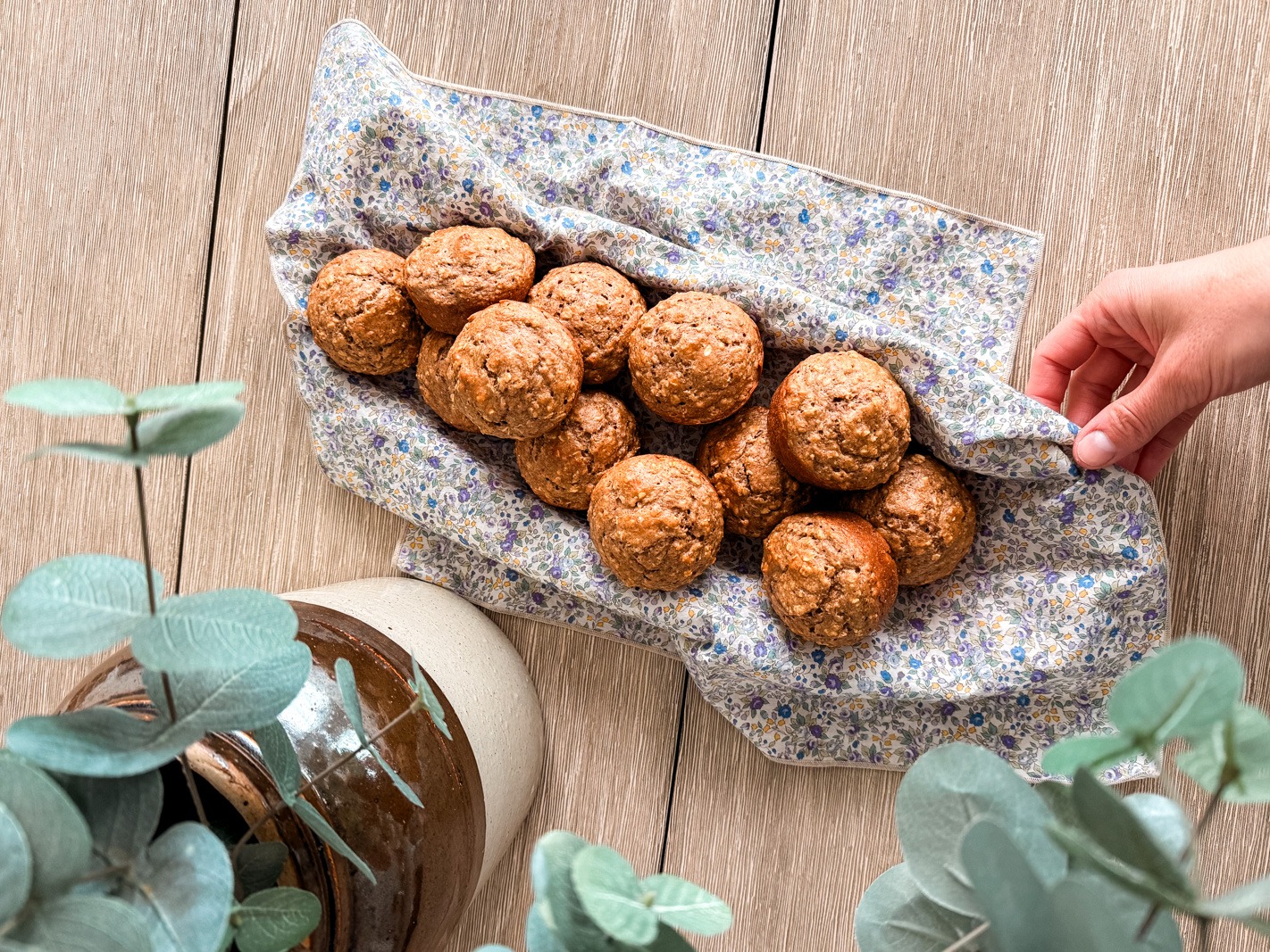 Basket of muffins on a table